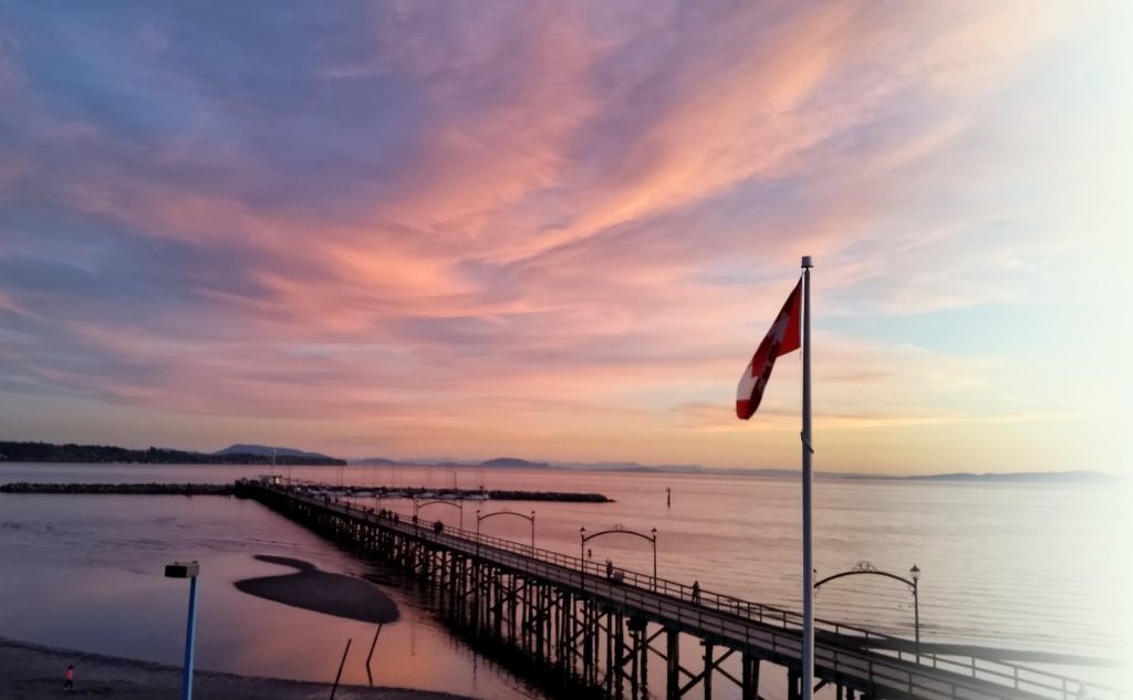 Canadian flag waving at pier